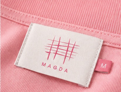 MAGDA identity on a textile label